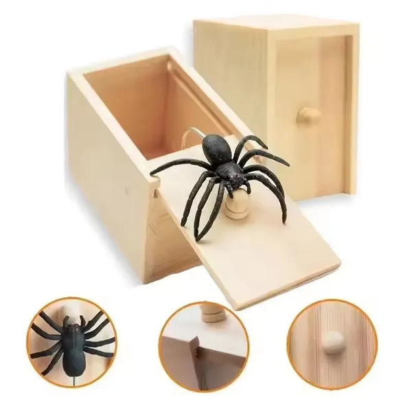 A wooden box designed to hold a spider, used as a prank item or party decoration.