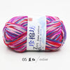 A ball of bright multi-colored yarn, featuring shades of pink, red, and blue, labeled as color 05, for knitting and crochet.