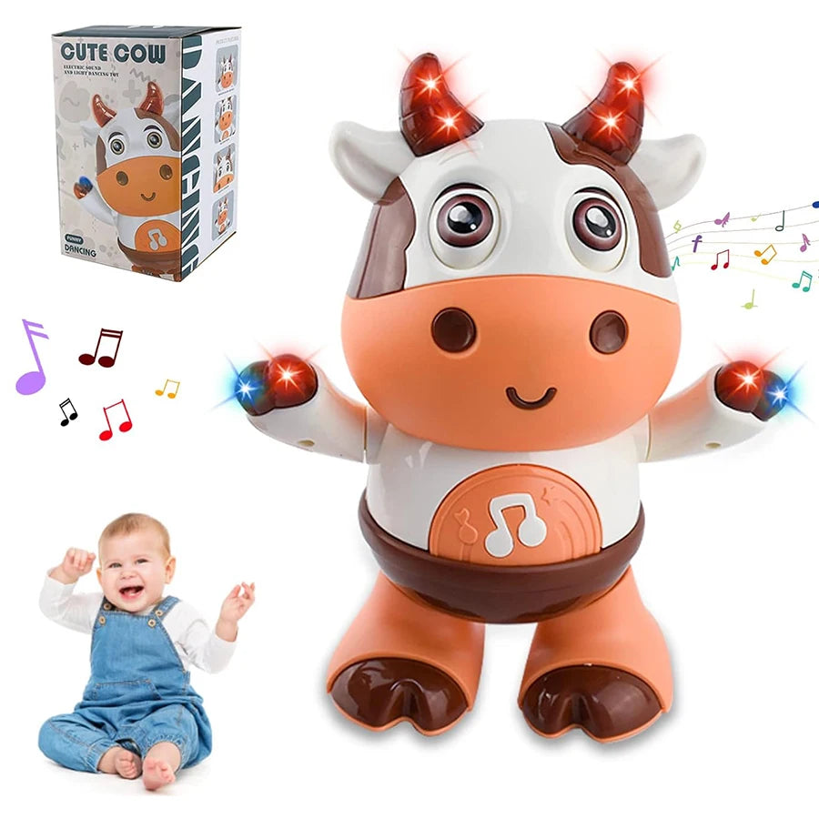 A cute, white and brown plush toy of a cow with glowing horns and musical notes, shown next to its packaging and a baby.