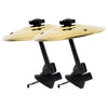 A gold-colored clip-on car vent drum cymbal with black adjustable hooks.