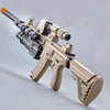 A close-up view of an electric gel blaster gun with a rechargeable battery, shown in a light tan color.