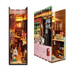 A DIY book nook kit featuring a detailed miniature Japanese-style shop with LED lighting and a dust cover.