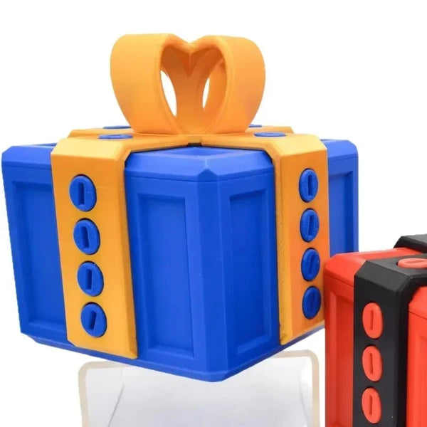 A blue and orange pop-up surprise gift box with a heart-shaped bow.
