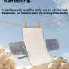 A white portable waterproof baby changing mat with a blue carry handle is shown hanging on a line against a cloudy sky.