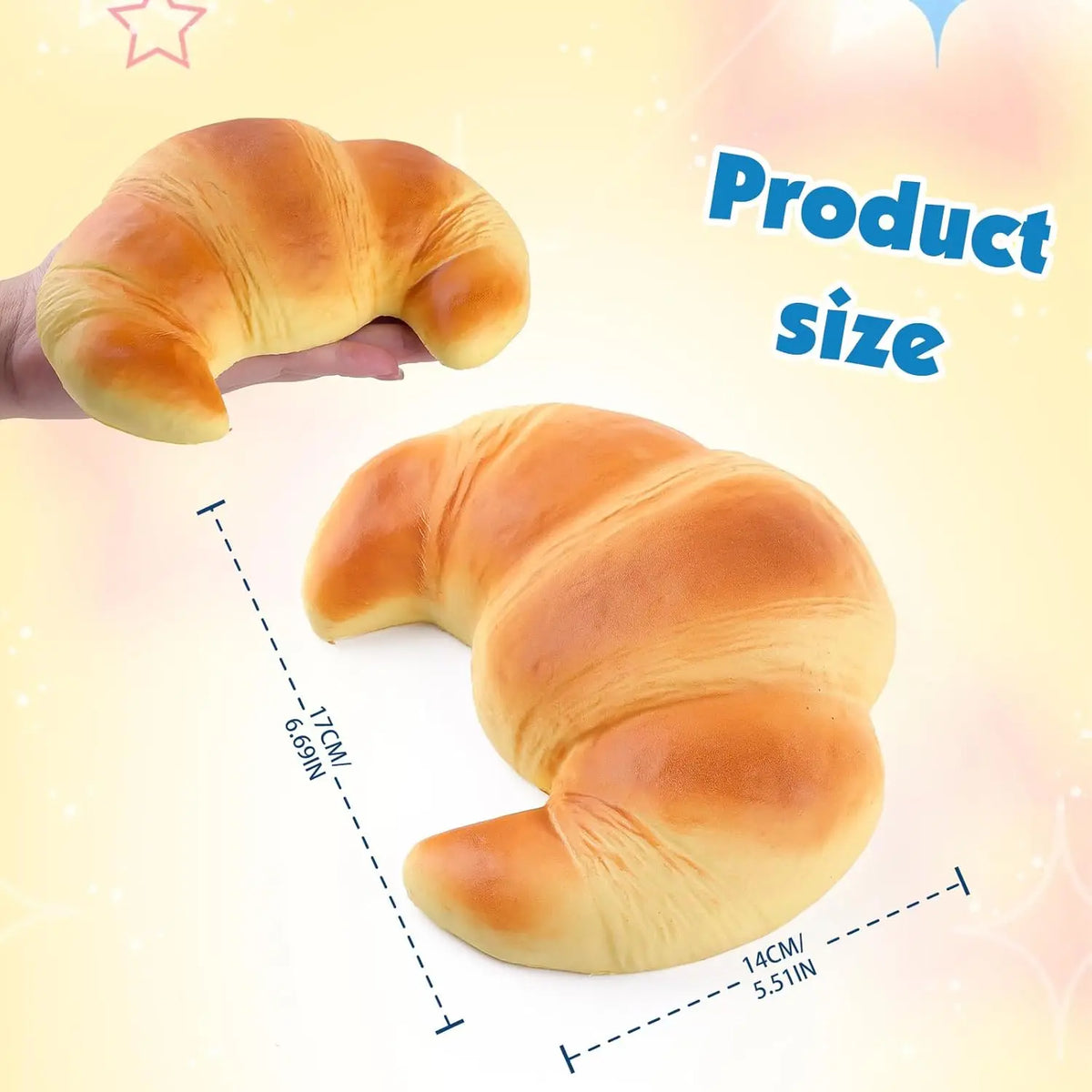 A golden croissant is shown being held, with measurements indicating its size.