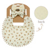 A set of baby flower bib and headband featuring a light cream fabric with pink floral patterns.