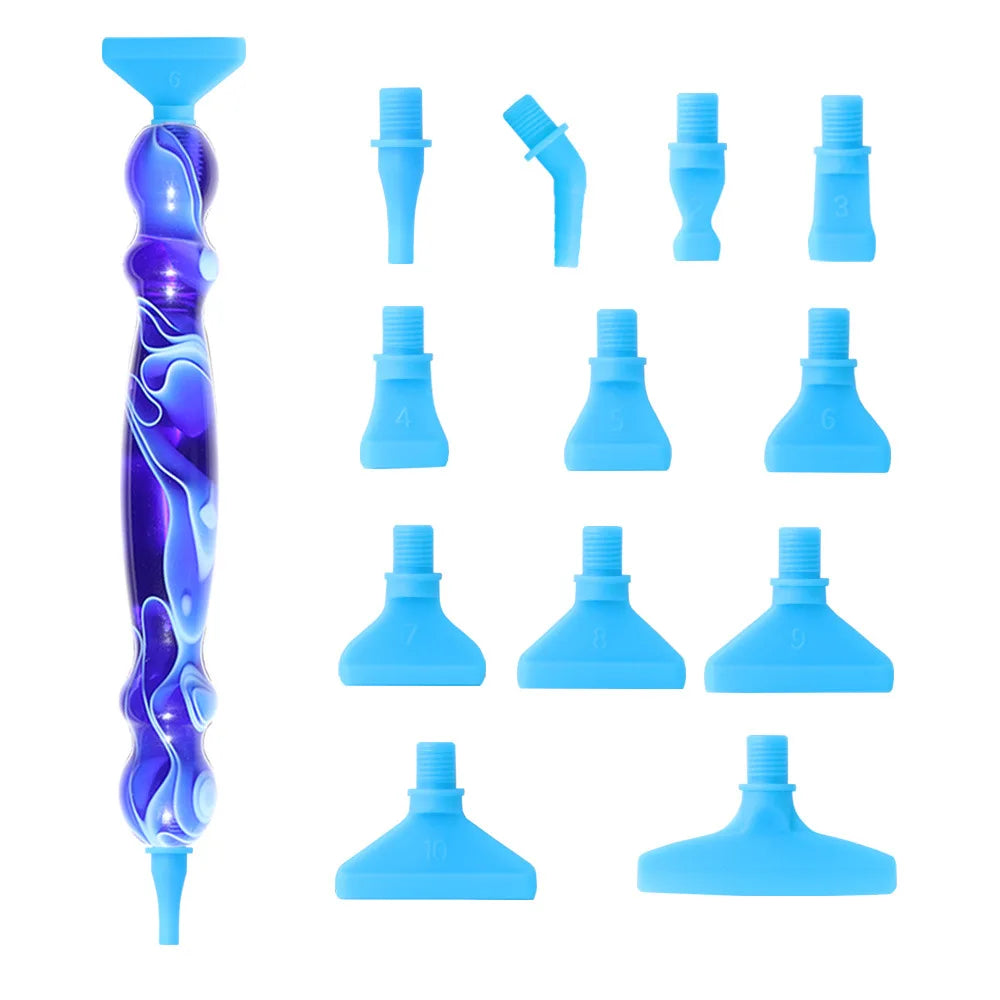 A collection of twelve interchangeable tips for a Diamond Art pen kit, shown in various shades of blue and purple.