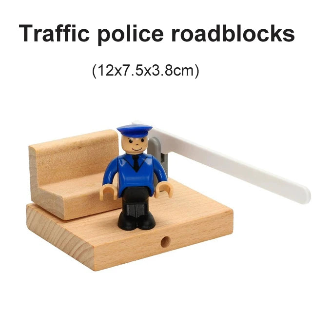 A wooden traffic police roadblock figurine with a white barrier, used as a train track accessory.