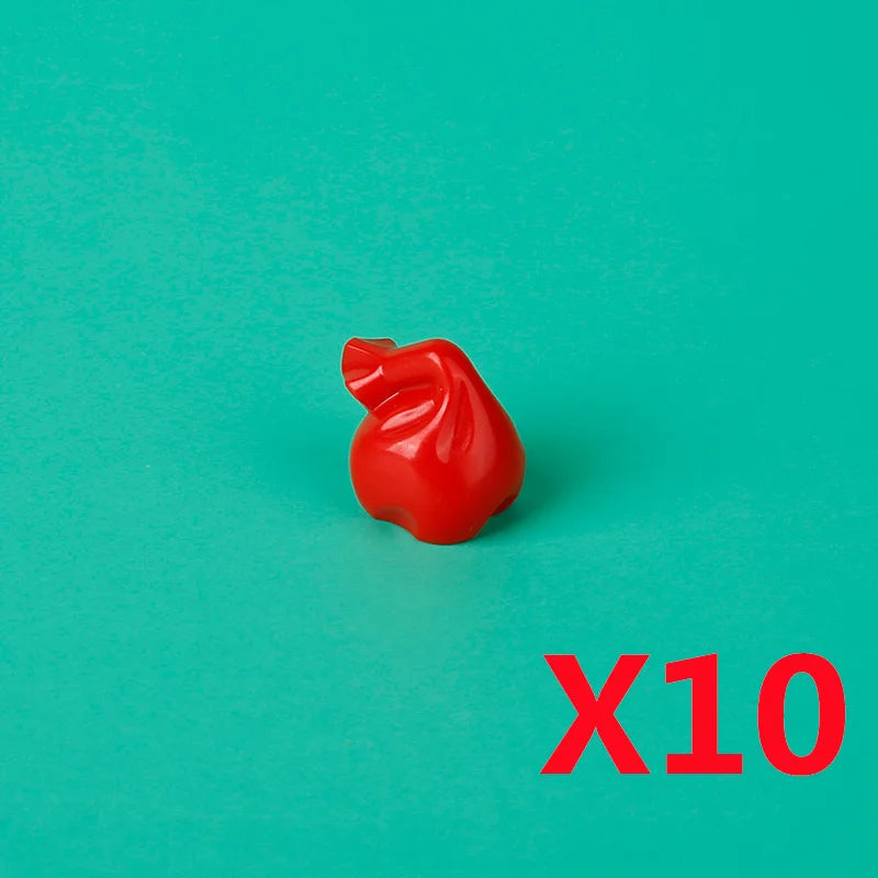A single red building block treasure chest is shown against a teal background with the text X10.
