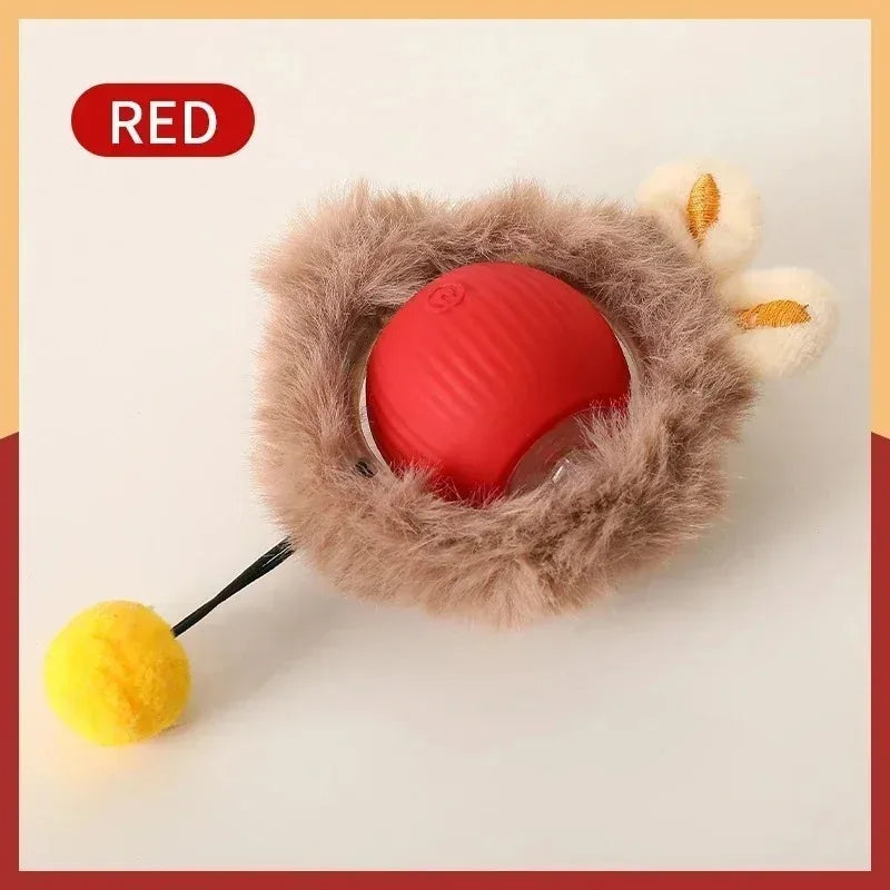 A red motion-activated cat toy featuring a pink ball covered in fluffy brown and cream faux fur.