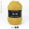 A ball of yellow milk cotton yarn labeled as color 01, ready for knitting or crochet.