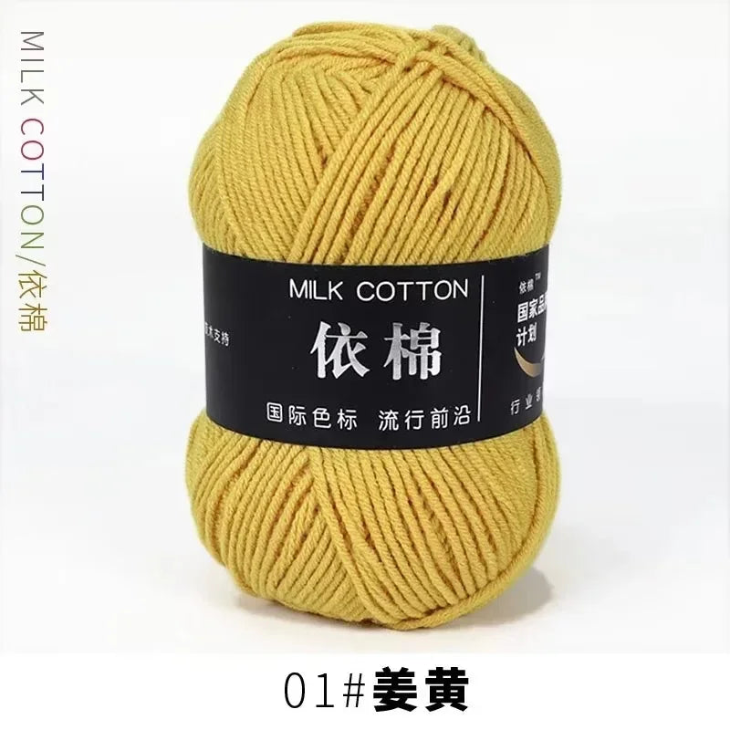 A ball of yellow milk cotton yarn labeled as color 01, ready for knitting or crochet.