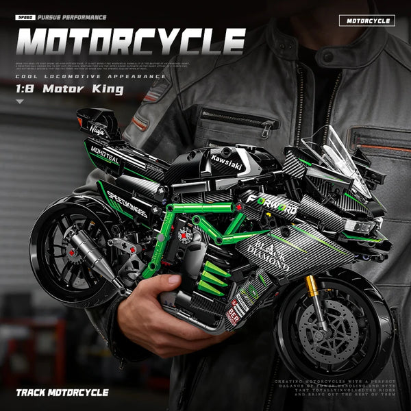 A detailed 1:8 scale model of a Kawasaki motorcycle with green and black accents is held by a person.