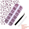 A nail art rhinestone kit featuring pink glitter gems and tools including a drill pen and tweezers.