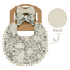 A beige baby flower bib and headband set with a floral pattern shown next to its packaging.