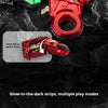 Red metal gun-shaped fidget slider with glow-in-the-dark strips and a dual-color night light.