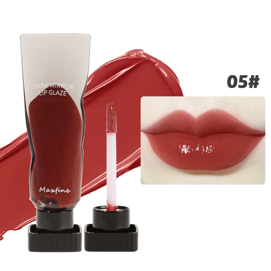 A tube of dark red lip glaze and a wand applicator for the Maxfine Hydrating Mirror Lip Glaze shade 05