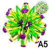 A colorful expandable magic ball toy with green and yellow strands and purple spheres.
