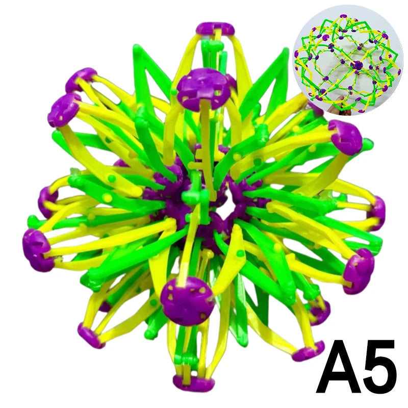 A colorful expandable magic ball toy with green and yellow strands and purple spheres.
