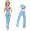 Fashion doll outfit set featuring a pink floral crop top and light blue jeans