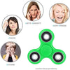 Green ABS tri-spinner fidget toy used for anti-anxiety, anti-stress, and autism relief