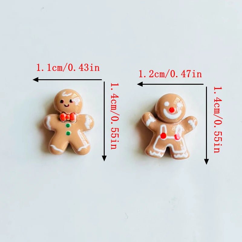 Two gingerbread man resin charms are shown with their dimensions labeled.