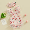 Pink baby girls summer romper set with matching bow and headband featuring a red cherry print