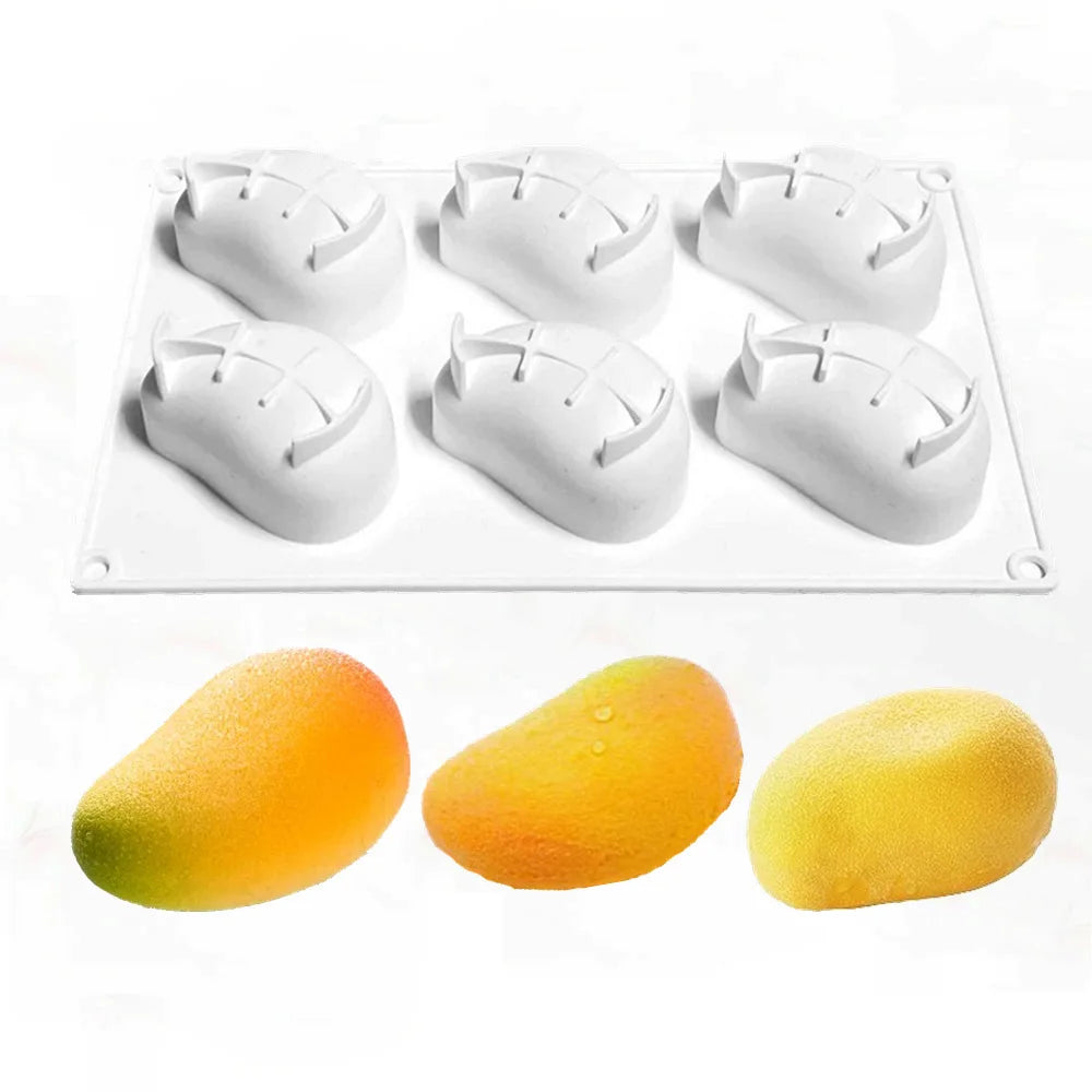 A white silicone mold with multiple fruit shapes for baking and desserts