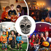 A ceramic Aztec skull whistle is shown in a white circle, surrounded by Halloween-themed decorations and people.