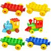 A set of large building block traffic vehicles in red, yellow, and green colors.