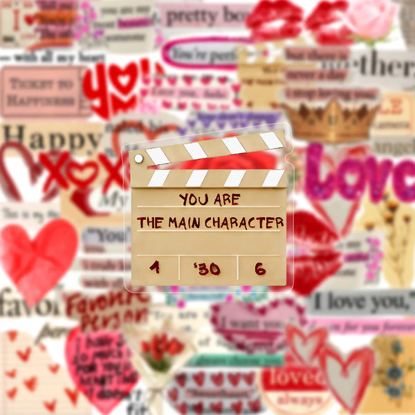 A collage of colorful graffiti pet stickers featuring hearts, lips, and text on a light background.