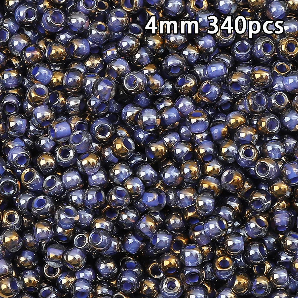 A close-up view of 340 glass beads with a golden gradient finish in various shades of blue and purple.