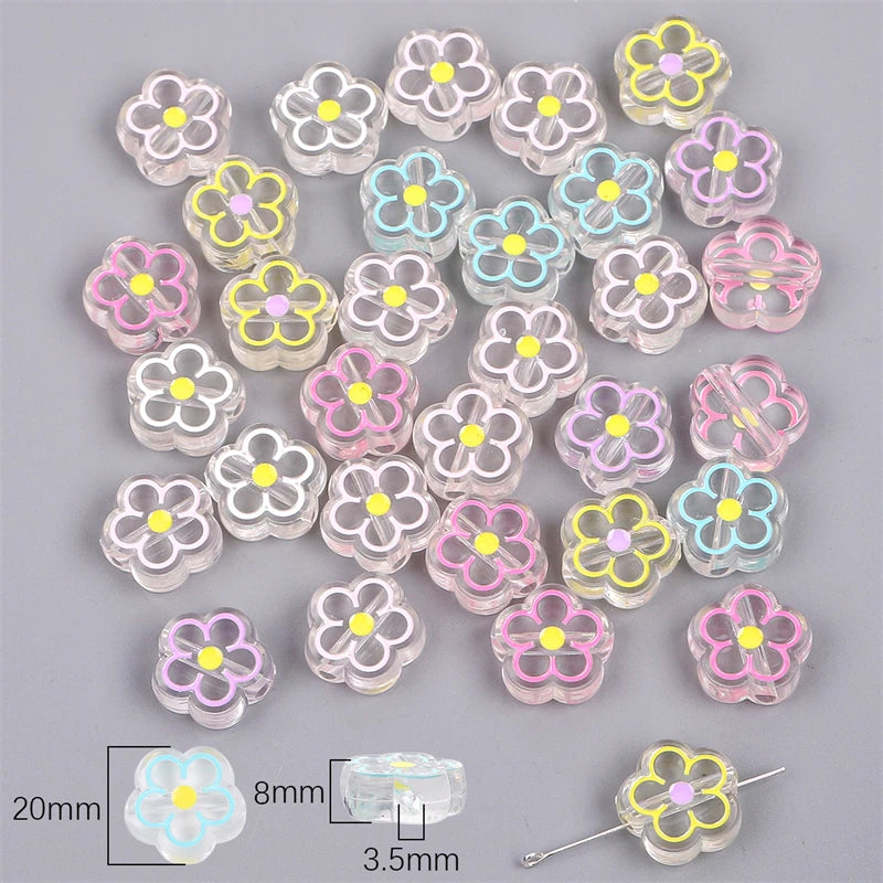 A collection of colorful enamel charm beads in various flower shapes and sizes for DIY jewelry making.