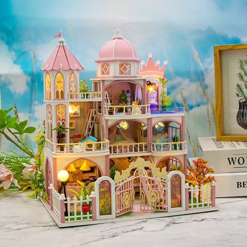 A detailed wooden dollhouse kit of a castle with pink and white accents, featuring LED lighting and furniture.