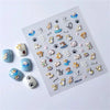 A sheet of 5D bronzing gothic nail art stickers featuring various paw prints and animal designs.