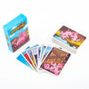 A box of the Drekssau adult party card game with a deck of cards displayed next to it.