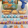 A collection of wooden nut hand disassembly puzzles and tools including a screwdriver and pliers on a gray surface.