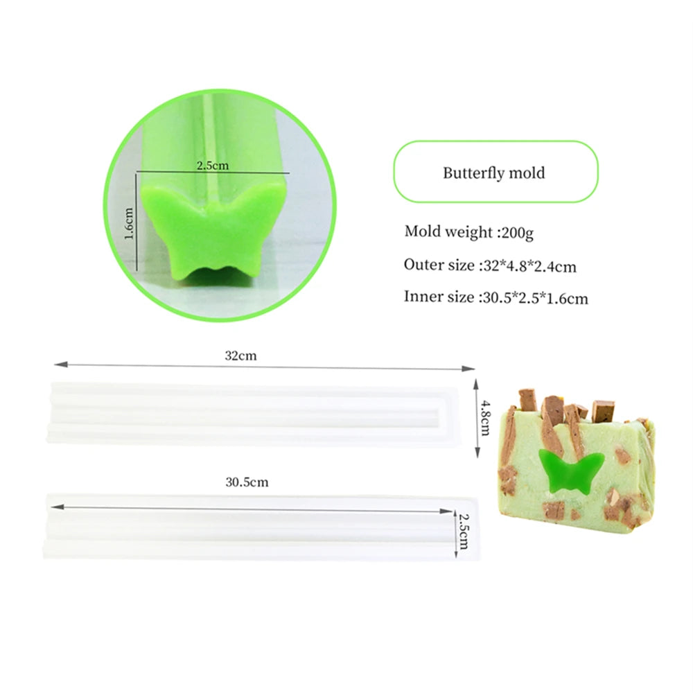 A silicone butterfly mold is shown alongside a rectangular mold and a finished green soap or candle product.