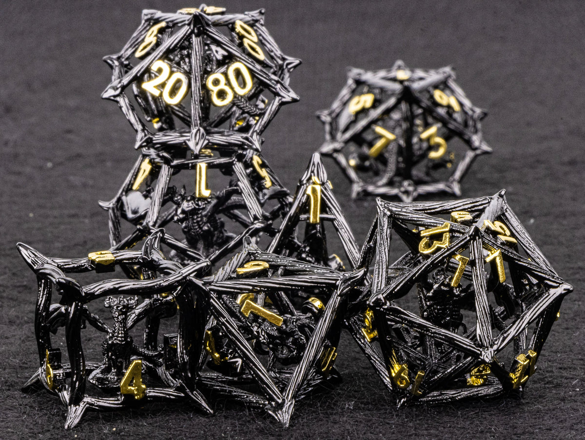 A pile of black metal dice, including a d10 and d20, is shown on a dark surface.