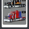 A black Peterbilt 389 diecast truck model with lights and sound, shown in a side profile.