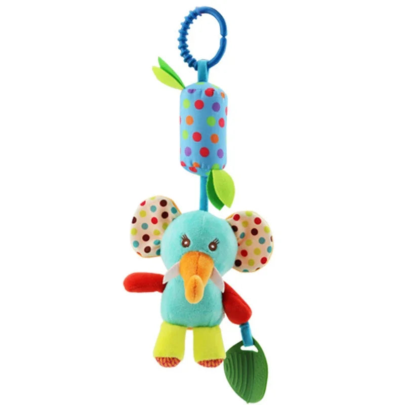 A soft plush hanging baby toy shaped like a blue bird with a green beak and yellow feet.