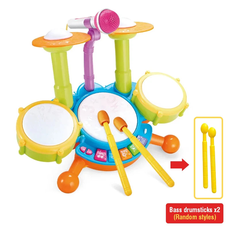 A colorful interactive kids drum set featuring a microphone, light-up pads, and bass drumsticks.