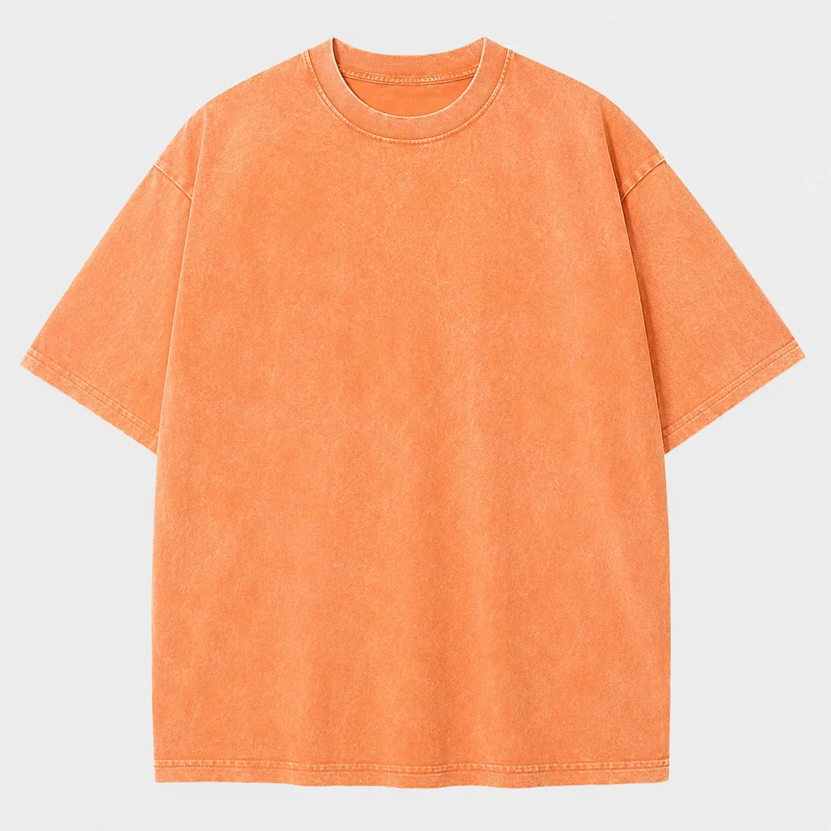 An oversized orange retro washed cotton t-shirt displayed flat.