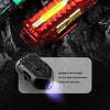 Red and green metal gun-shaped fidget slider with UV light for stress relief