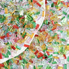 A pile of multicolor ice strip acrylic filler in various shades of green, yellow, pink, and red for nail art and crafts.