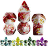 A collection of acrylic dice showing various colors and blood effects for tabletop gaming.