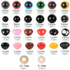 A collection of plastic safety eyes and noses in various colors, sizes, and quantities for dolls and stuffed animals.