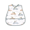 A white baby bib featuring a cartoon pattern of light blue and orange vehicles and numbers