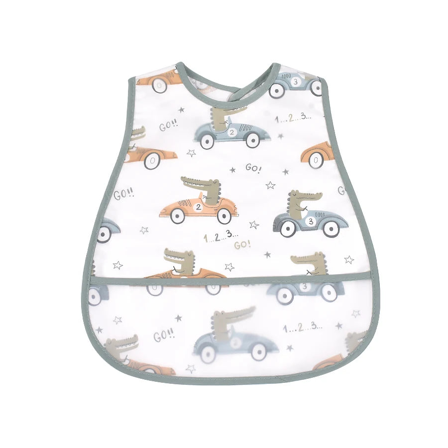 A white baby bib featuring a cartoon pattern of light blue and orange vehicles and numbers