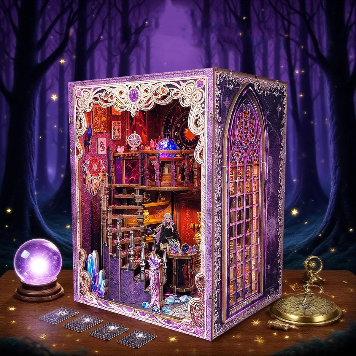 A decorative box kit for a tarot association book nook featuring intricate details and LED lighting displayed on a wooden sur